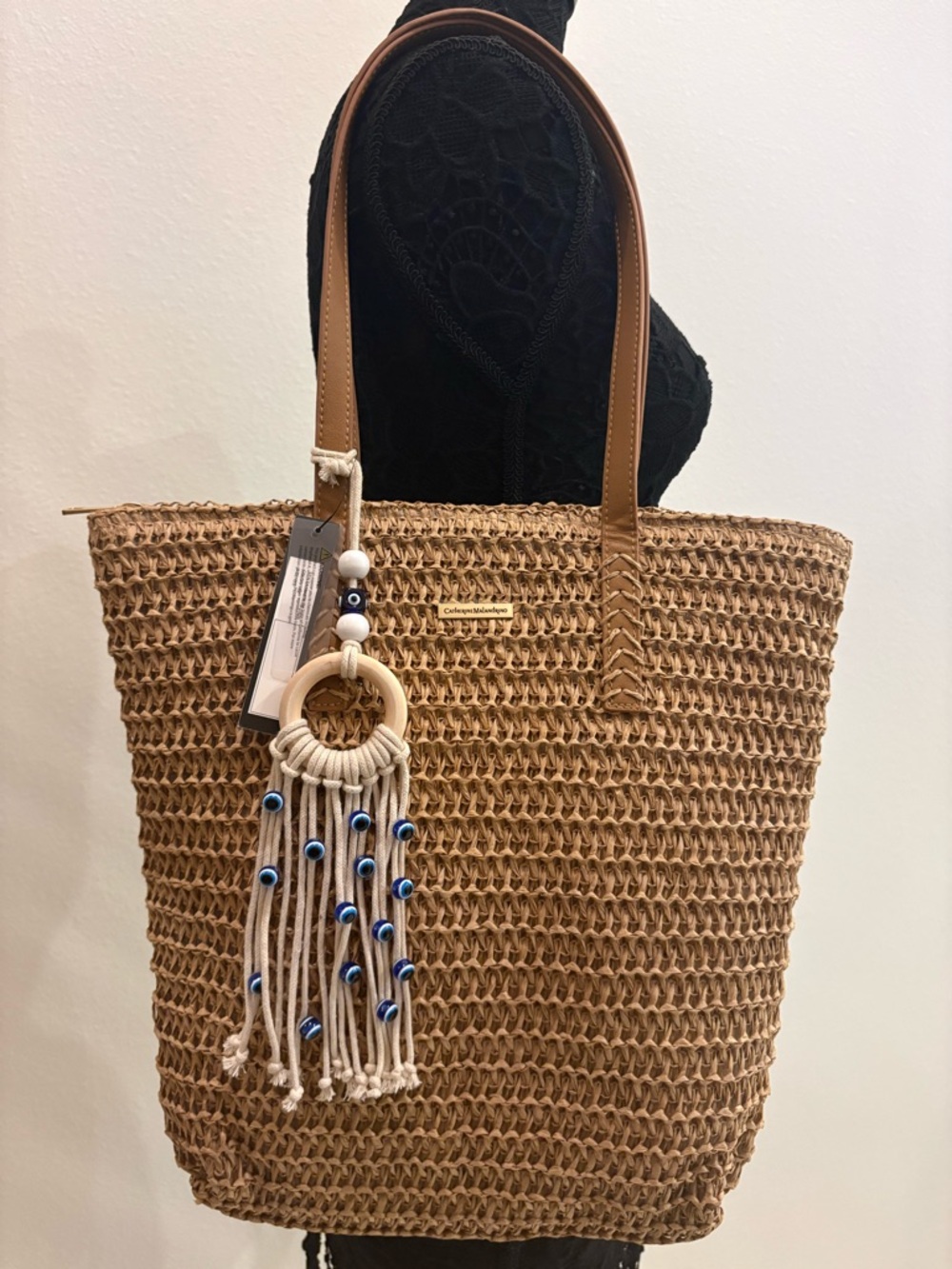 Catherine Malandrino Woven Straw Tote with Tan Handles and Blue-Bead Tassel
